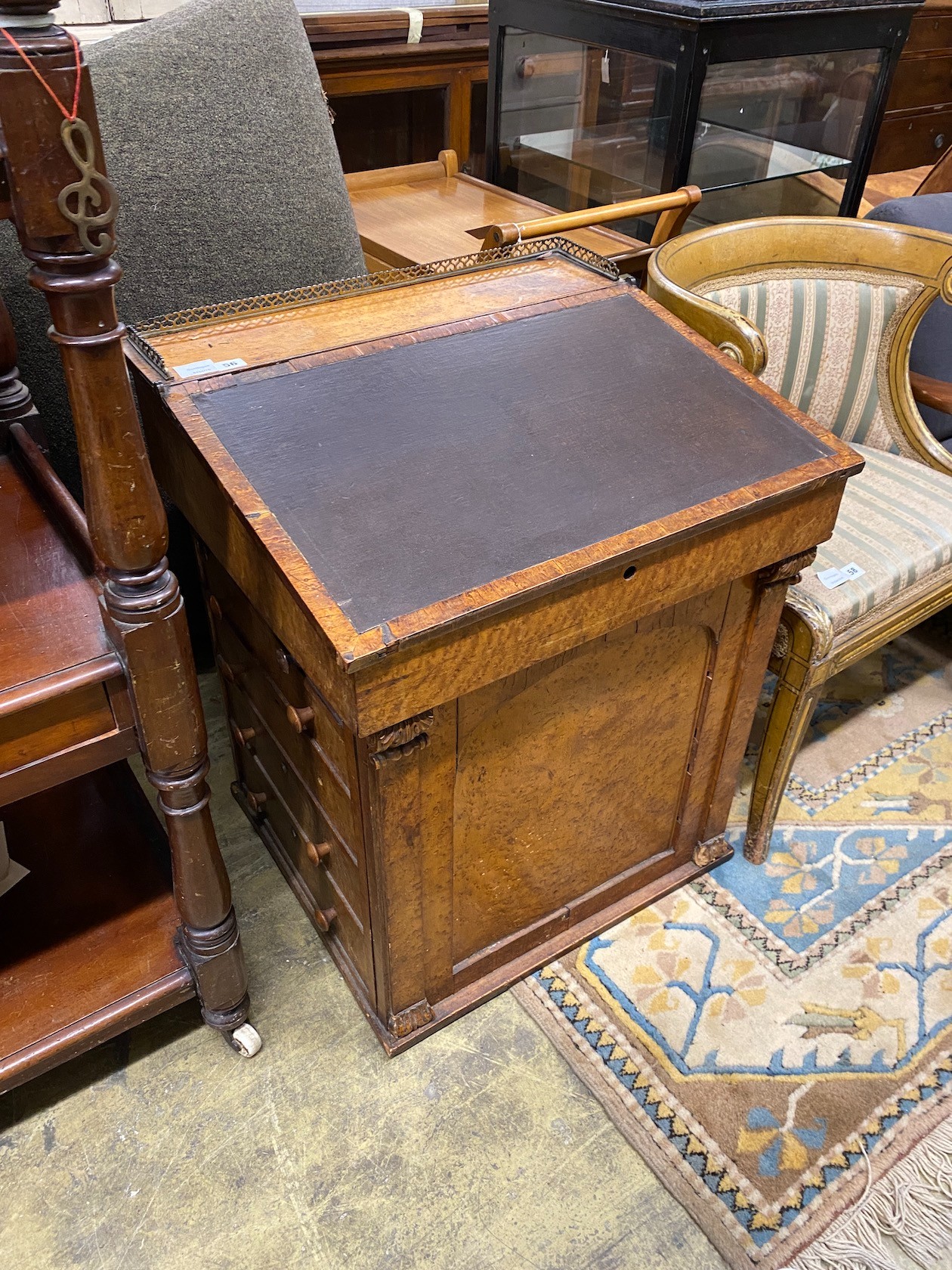 A Regency bird's eye maple veneered davenport (in need of restoration), width 61cm, depth 55cm, height 76cm